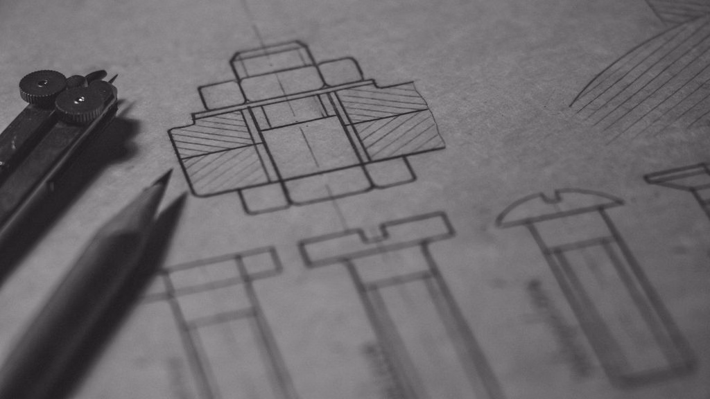 Detalhamento de projeto mecânico com desenho técnico de parafuso e porca em corte